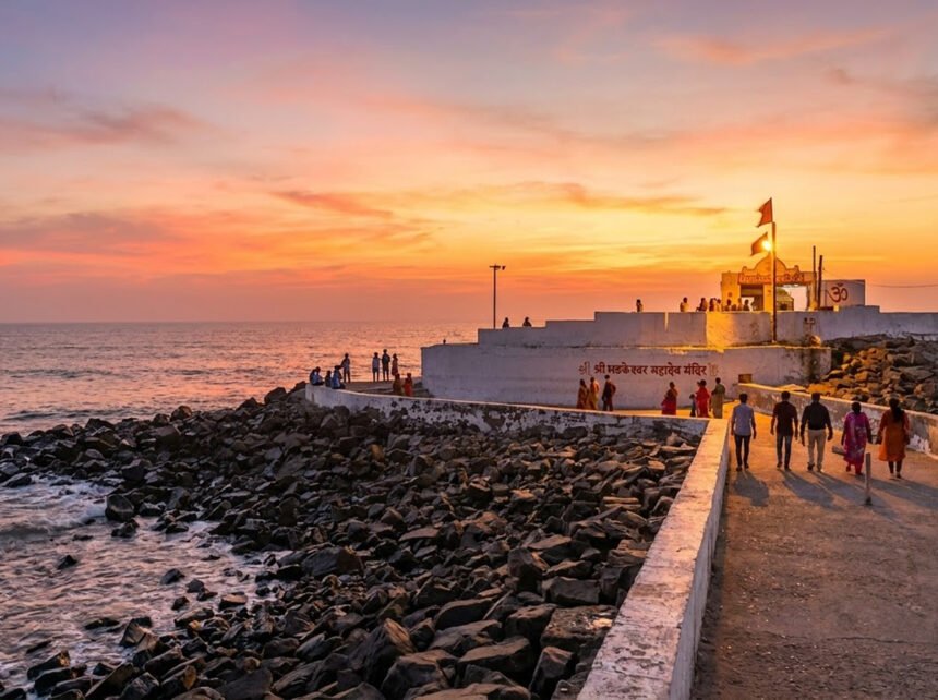 Bhadkeshwar Mahadev Temple in Dwarka, Gujarat, surrounded by the Arabian Sea during sunset.