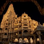 Intricately carved pillars and architectural details inside the Dwarkadhish Temple complex.