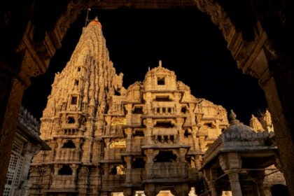 Intricately carved pillars and architectural details inside the Dwarkadhish Temple complex.