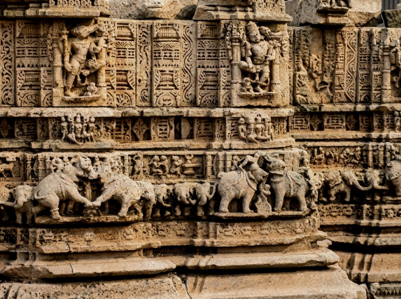 Intricately carved pillars and architectural details inside the Dwarkadhish Temple complex.