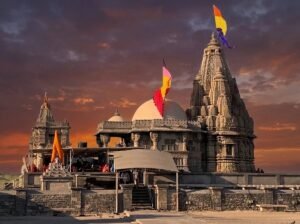 Front view of Rukmini Devi Mandir in Dwarka, Gujarat, showing the sandstone carvings and temple spire.
